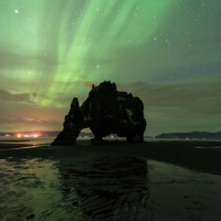 Northern lights above Hvitserkur ©Phototravelers